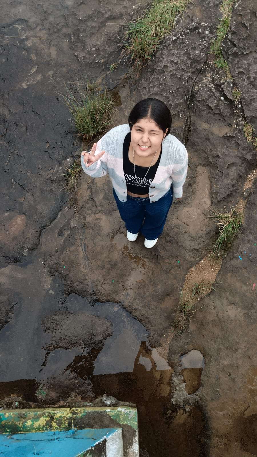 Harshita looking up outdoors